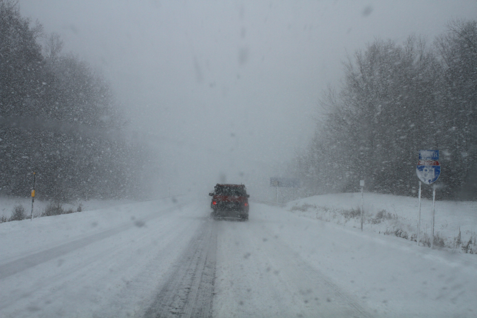 Car driving on snowy road