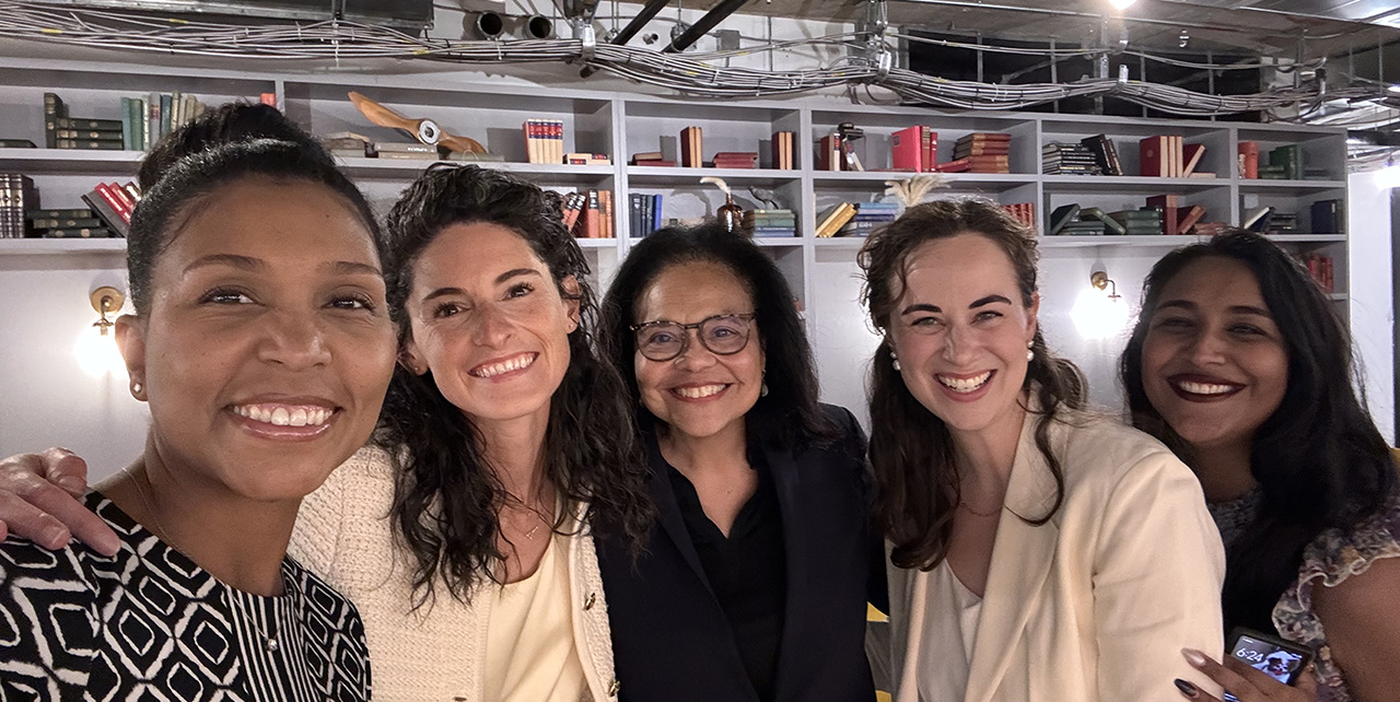 women standing together for a photo