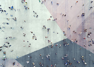 overhead view of people walking through a city