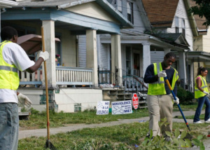 city workers cleaning up a neighborhood 