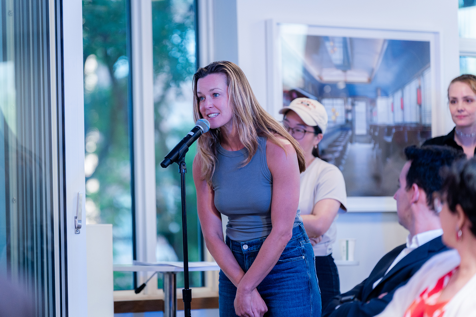 Audience member asks a question at event on collaboration research